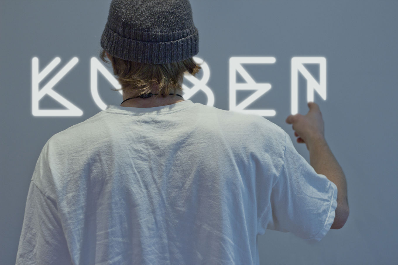 Foto: Mann rygg Kuben Mann rygg Kuben