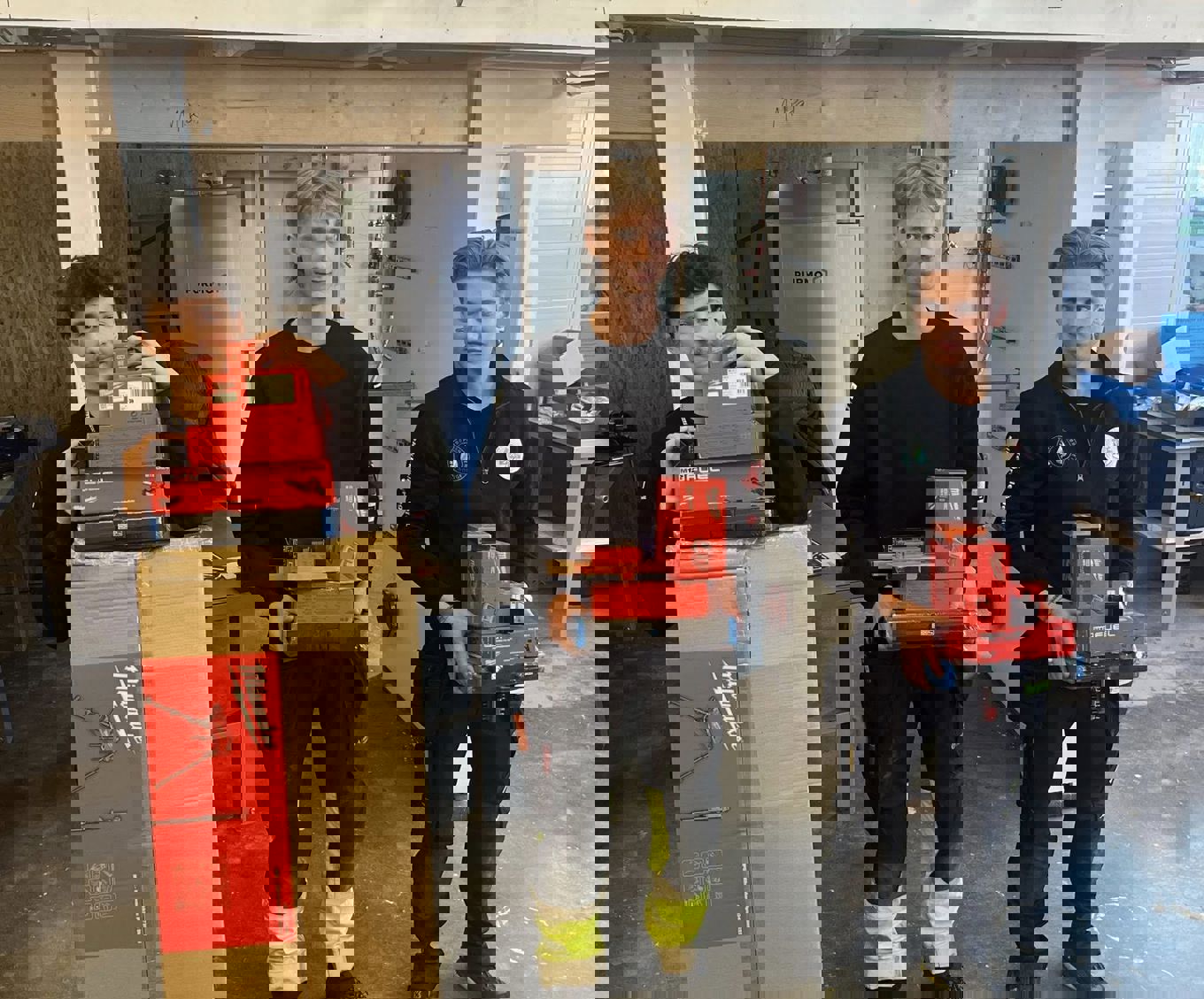 Chris med premier, sammen med sølv- og bronsevinner